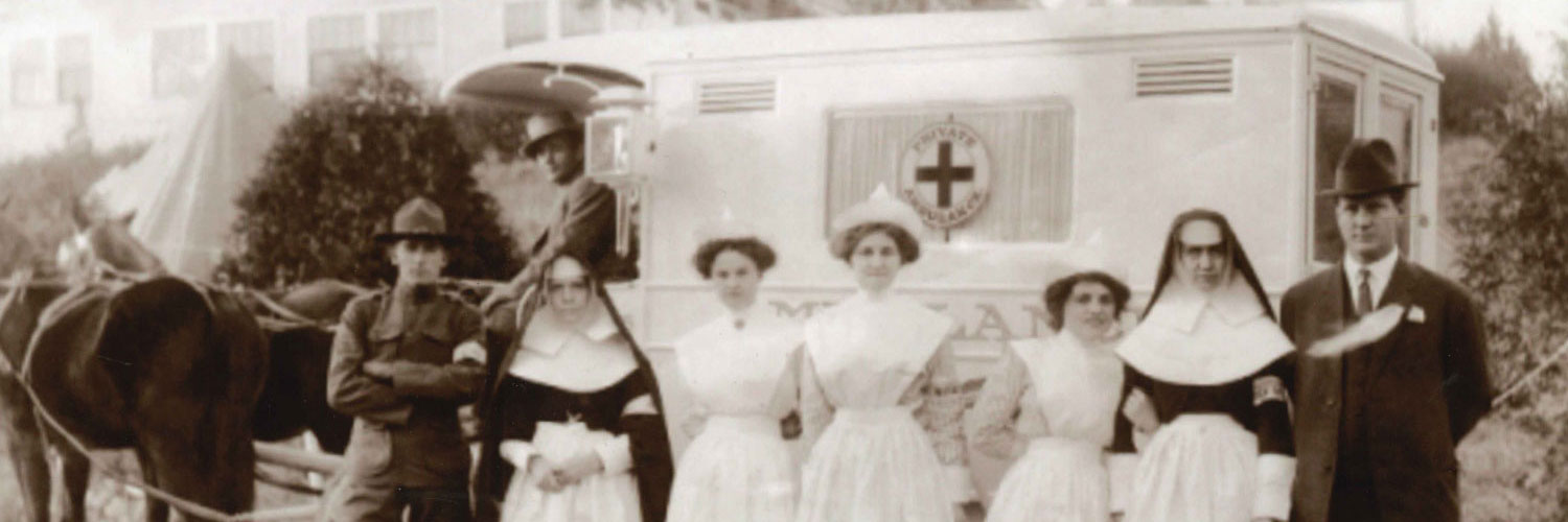 A vintage photo that shows a horse-drawn ambulance